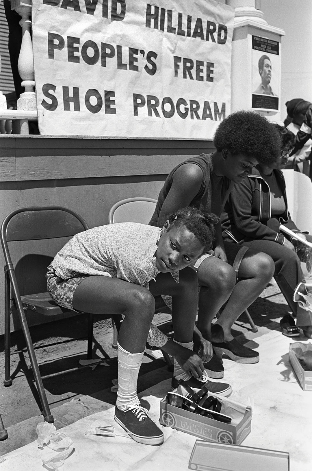 Free Shoe Program. Black Panther Party’s Black Community Survival Conference in DeFremery Park, Oakland ,1972. © Stephen Shames